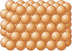 An illustration shows a three-dimensional structure of atoms tightly packed together.