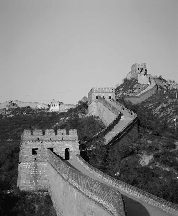 Figure 14-1: The Great Wall of China is an enduring symbol of the human fondness for dividing and controlling the Earth.